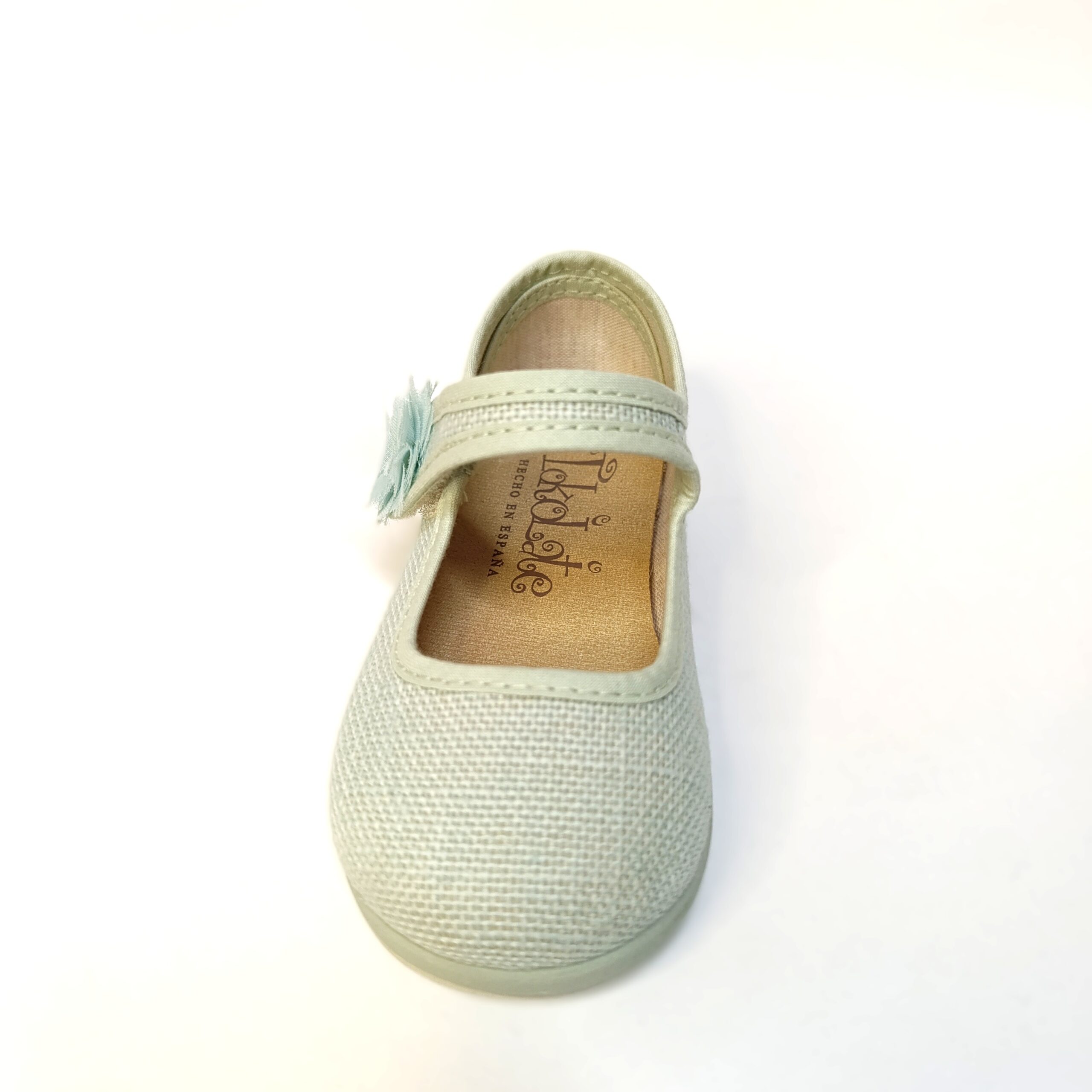 Mercedes ceremonia niña lino verde salvia