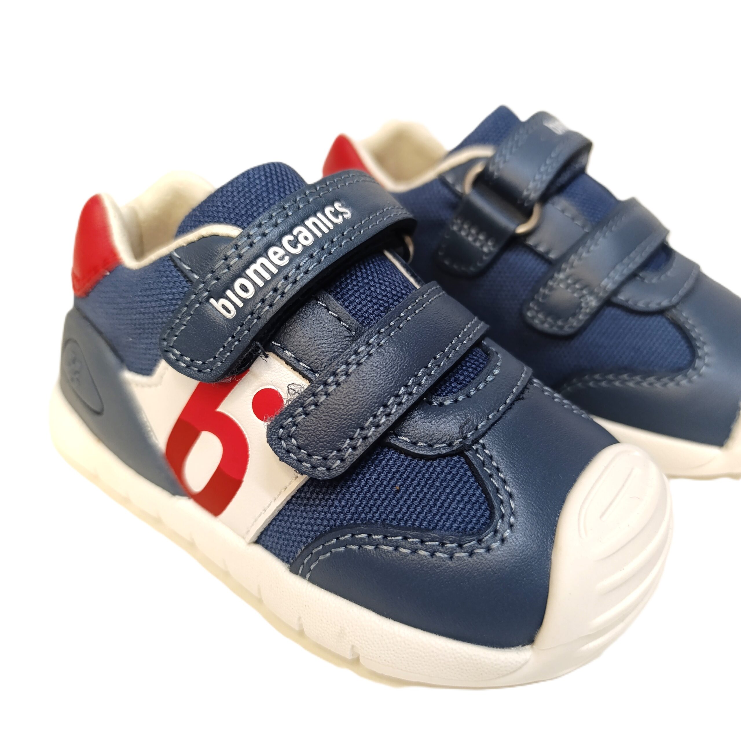 Deportiva biomecanics primeros pasos niño azul